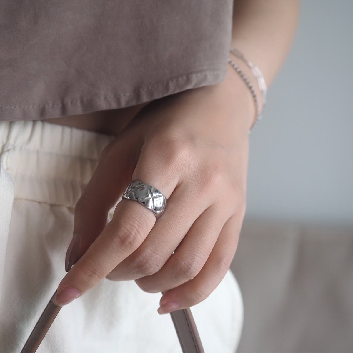 woman-wears-eye-catching-silver-ring.jpg